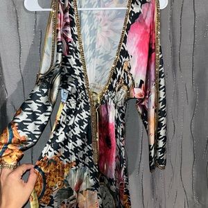 Baccio Couture Dress size S , like new. Only wore once . Very cute and classy.